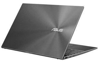 Asus laptop with its lid open and Asus logo visible.
